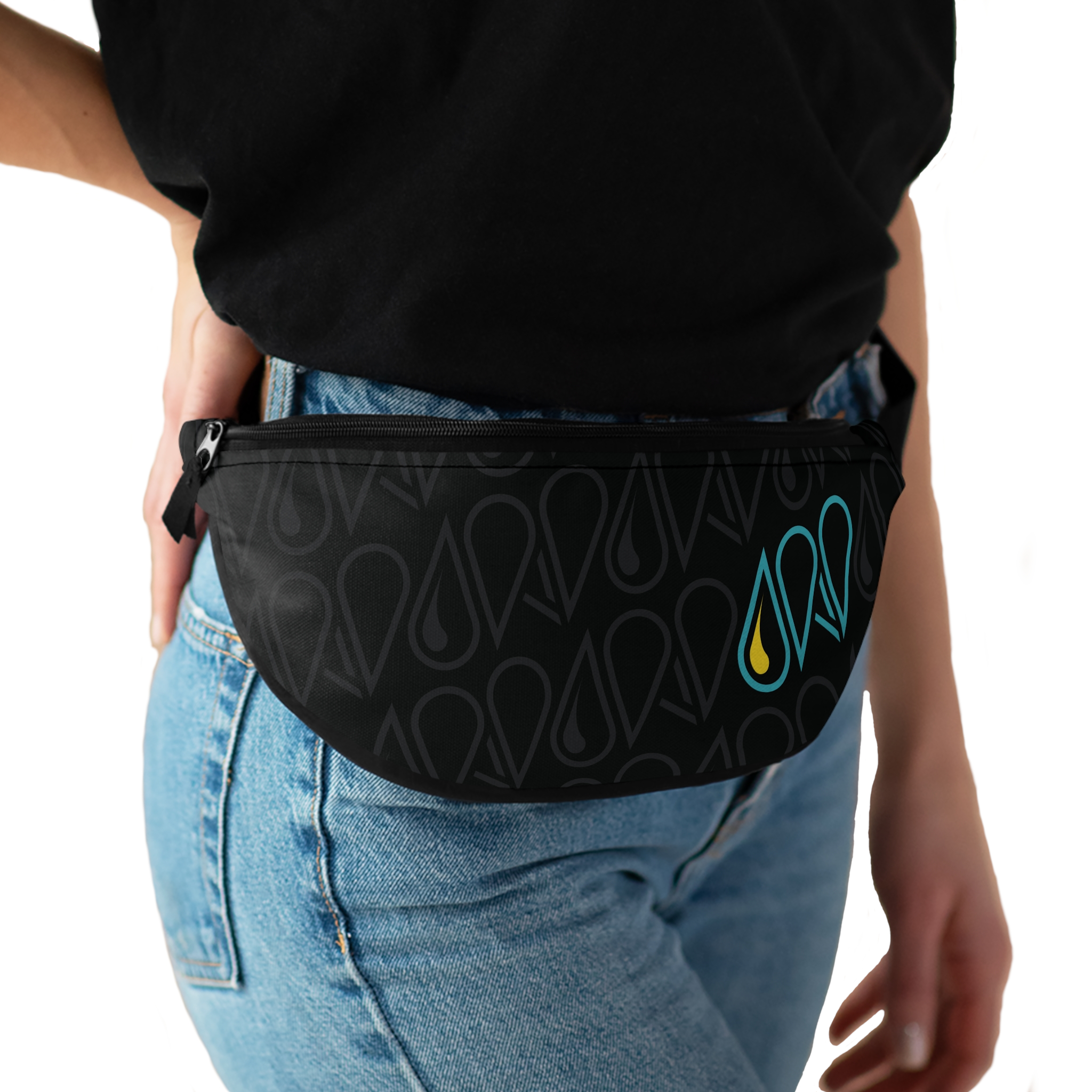 View of a woman wearing the ARCHIPELAGO pack on her hip.