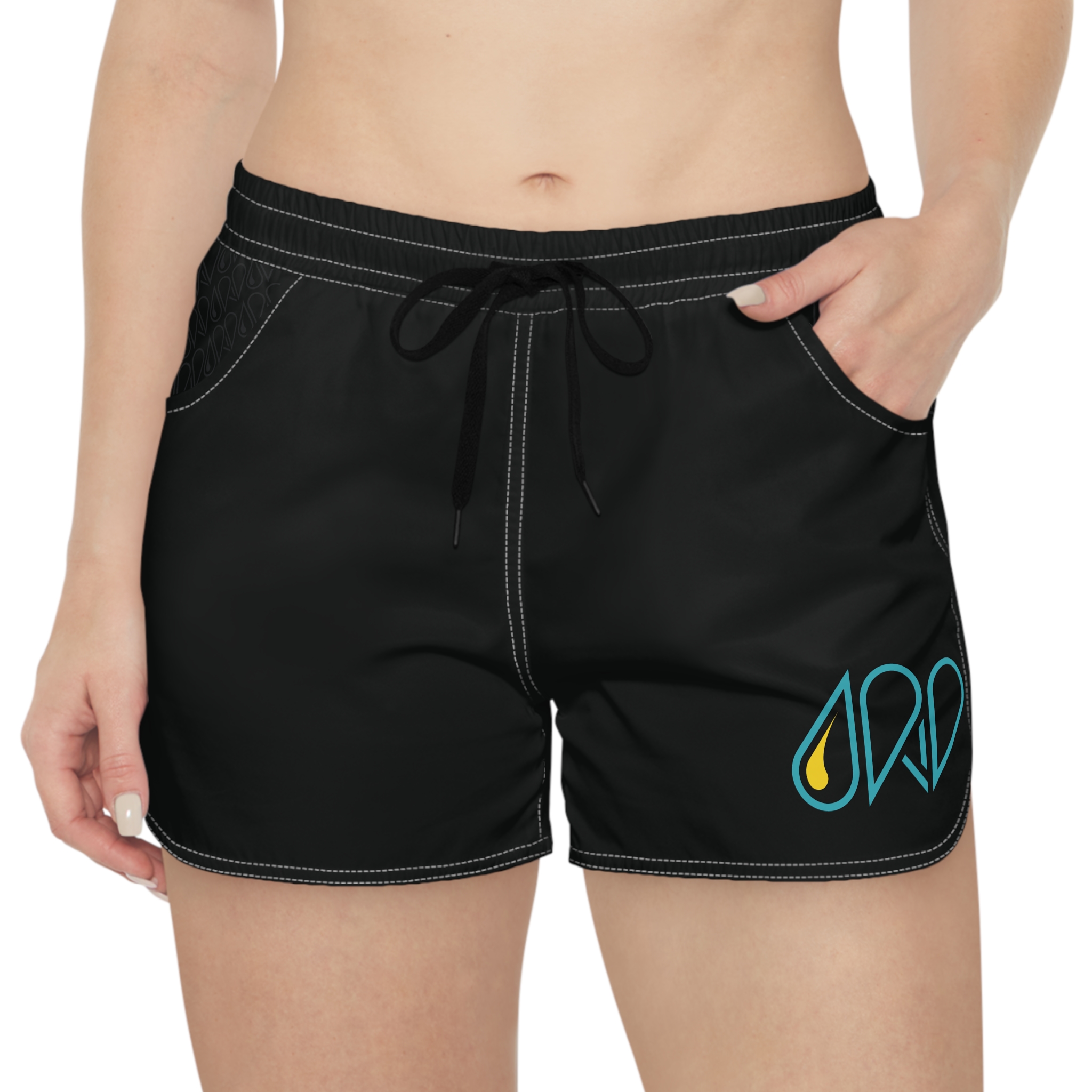 Front view of a woman wearing the OASIS shorts.