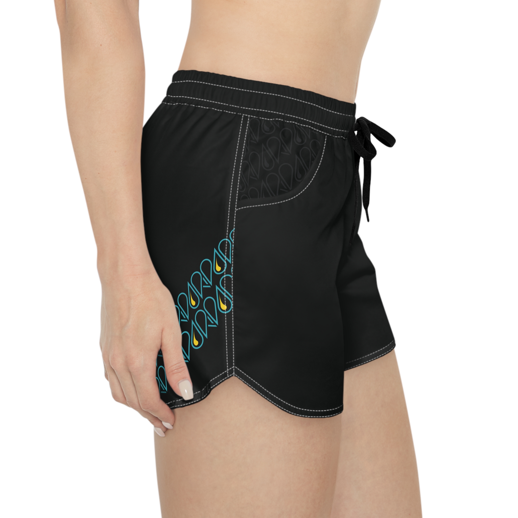 Right side view of a woman wearing the OASIS shorts.